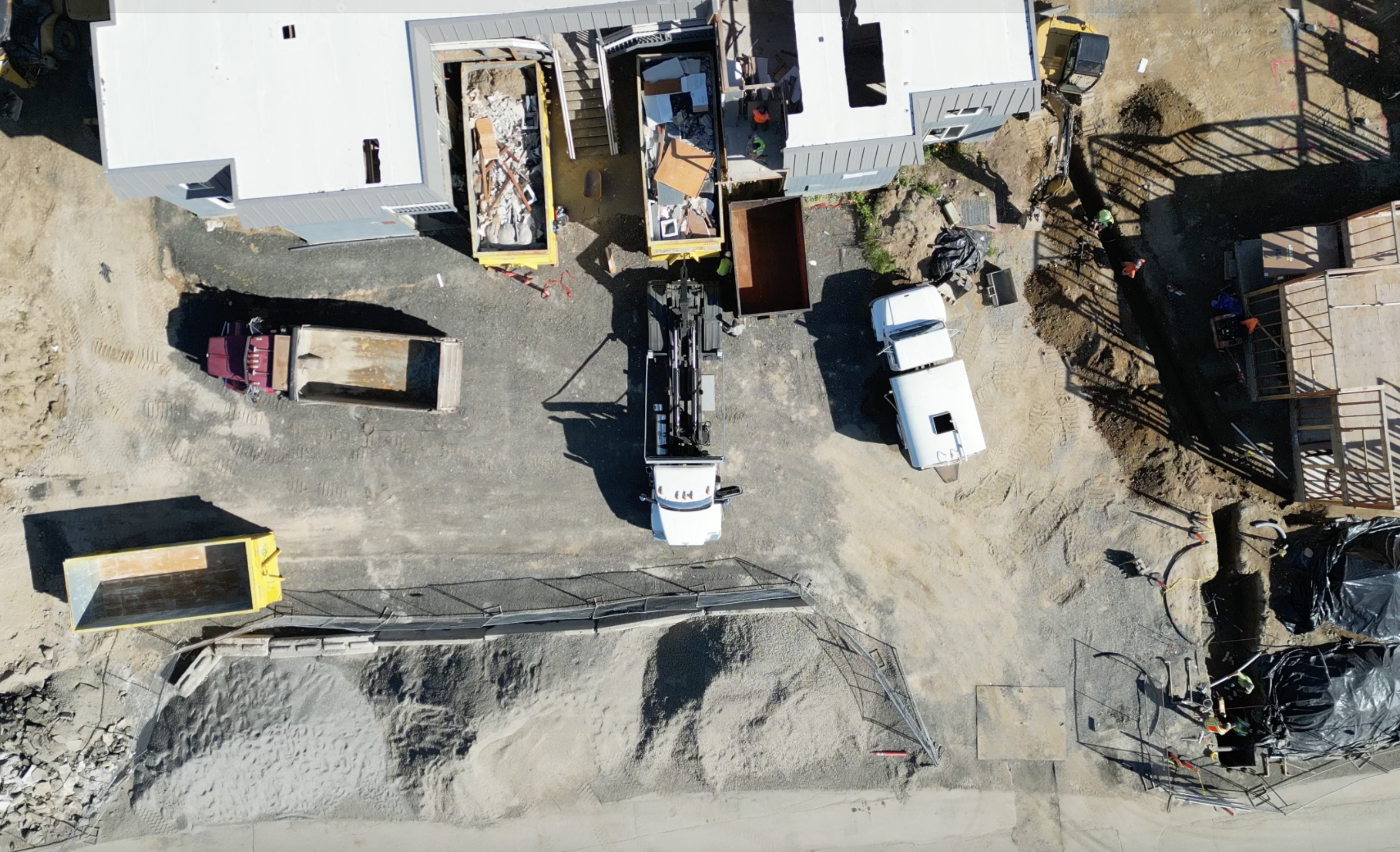 Job site with loaded dumpster